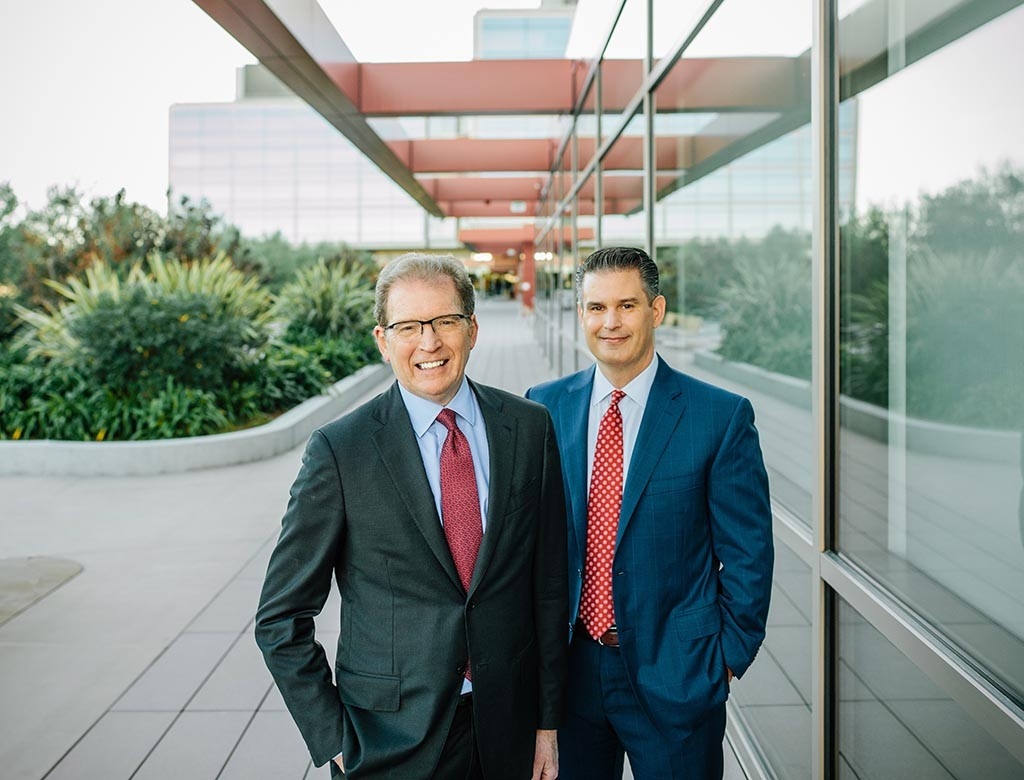 Dean Lloyd Minor, left, and Stanford Hospital CEO and Vice President David Entwistle.