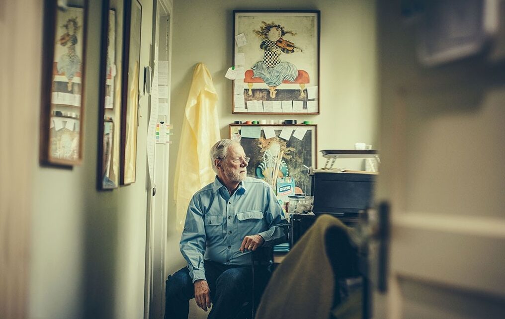 Ron Davis sitting outside his son'e room. by Timothy Archibald