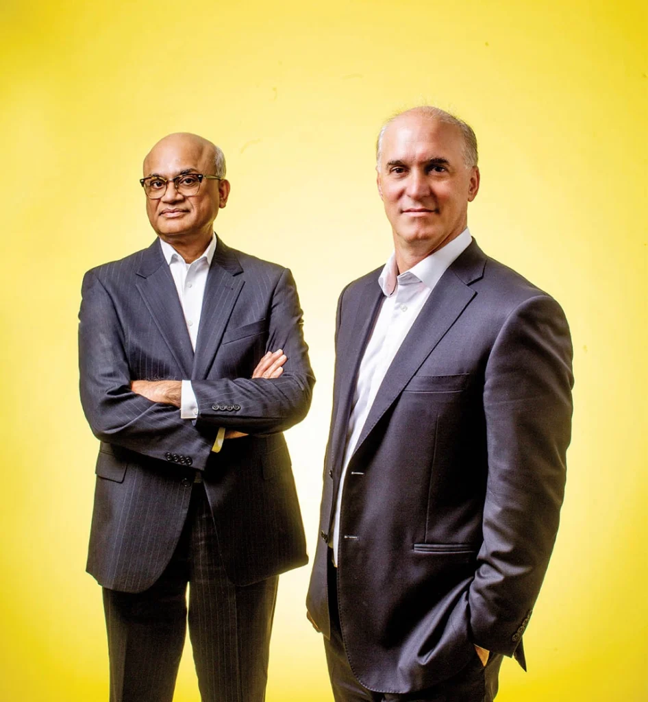Photo of Stanford Cancer Institute Director Steven Artandi, right, with Stanford Medicine Cancer Center President Sridhar Seshadri.