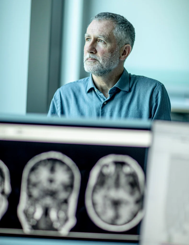 Photo of Stanford Medicine neurologist Mike Greicius, MD, PhD, in his Stanford Medicine lab.