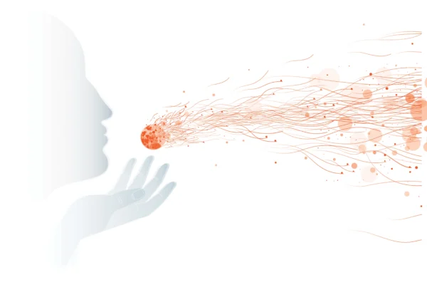 Illustration of someone blowing on a cell with bits of it flying outward