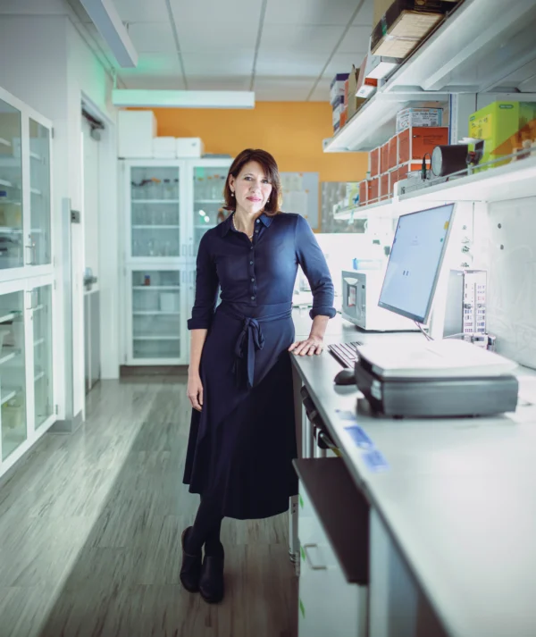 Juliet Knowles standing in her Stanford Medicine lab.