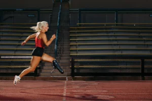 Paralympian Sydney Barta sprinter on Stanford University track.